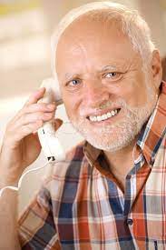 older man on landline phone call stock