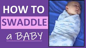 how to swaddle a baby labor and