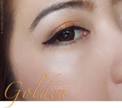 makeup tutorial golden orange eyes