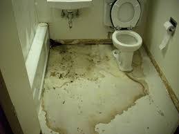 bathroom floor leaking water bathroom