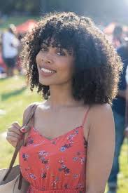 Proof that curly hair girls can wear bangs too. The Best Hairstyles To Pair With Bangs Hairstyles With Bangs Curly Hair Styles Naturally Curly Hair Styles
