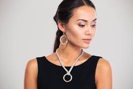 jewelry to wear with a black dress for