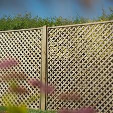 decorative fence panels frame a garden