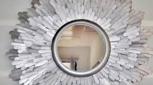 Starburst Mirror With Wooden Spoons