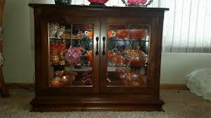 small console curio cabinet display