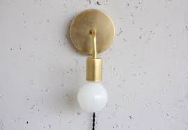 plug in wall sconce roy simple brass