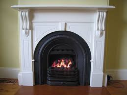 red fireplace with coal gas fire