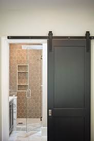Bathroom With Black Sliding Door On