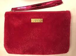 ipsy metallic pink fuzzy wristlet