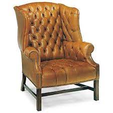 tufted leather wing back chair