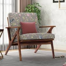 This ergonomic living room chair constitutes a fabulous proposition for one's office or bedroom. Arm Chairs Buy Wooden Arm Chair Online In India At Low Price Wooden Street