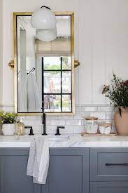 Gray Bathroom With Bronze Accents