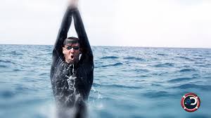 Michael Phelps races against a great white for Shark Week Daily.