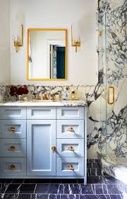 This half bathroom is narrow, but it doesn't look cramped, thanks to the white color palette. 46 Small Bathroom Ideas Small Bathroom Design Solutions