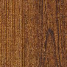 Trafficmaster laminate flooring is inexpensive and recommended for those that want to try their hand at flooring a room the easy way. Trafficmaster Hickory 6 In W X 36 In L Luxury Vinyl Plank Flooring 24 Sq Ft Case 12052 The Home Depot