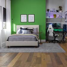 how to position area rugs in a bedroom