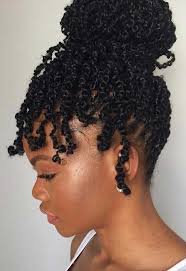 An impressive short black haircut with thick hair with surgical lines. Spring Twist Hairstyles