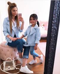 Biker Jacket In Light Blue With Jeans And White Sneakers For