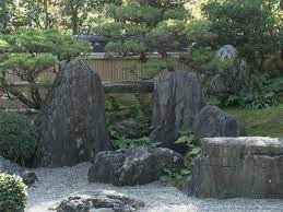 arranging stones in a japanese style garden