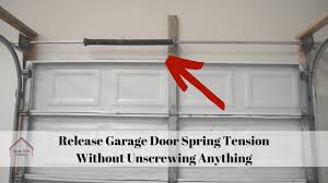 release garage door spring tension