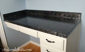 The giani slate countertop paint kit claims it'll transform your kitchen. Diy Faux Granite Countertops With Giani
