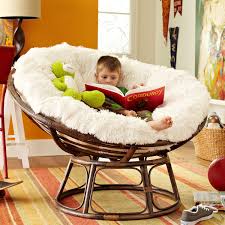 This piece of furniture is a product that features a durable metal frame with a folding function. The Papasan Chair A Design Classic With Many Different Versions