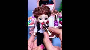 barbie doll with barbie makeup kit