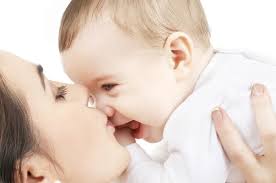 mom baby kiss stock photos royalty