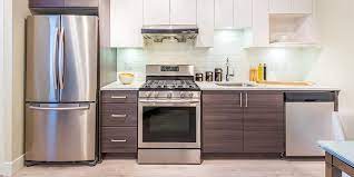 Clean the surface of the refrigerator door with warm water and detergent. 10 Surprising Ways To Clean Stainless Steel Appliances