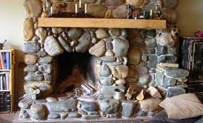 standout river rock fireplaces