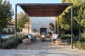 Wood And Iron Pergola With Fireplace