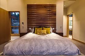 Fitting wood wall panelling or cork panels in a bedroom might not seem the most obvious choice for a wallcovering, but unlike paint or wallpaper, certain equally stylish is to simply use a feature panel of acupanel. Modern Master Bedroom With Wood Slat Panel Hgtv