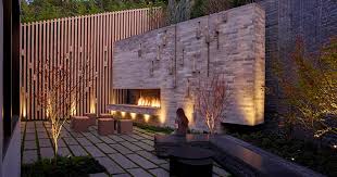 Outdoor Fireplace Is Also A Climbing Wall