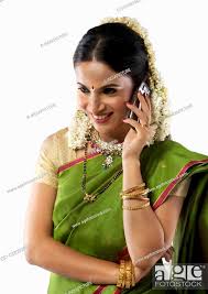 south indian woman talking on a mobile