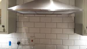 metro tile with grey grout in kitchen