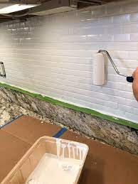 paint a tile backsplash in your kitchen