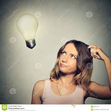 Girl Thinks Looking Up At Bright Light Bulb Stock Image