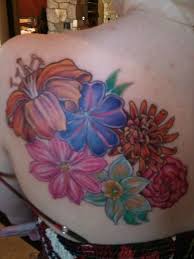 Family birth month flowers tattoo. This Is What I M Doing Except My Family Of Course And I M Thinking On My Thigh And Hip Area Birth Flower Tattoos Birth Month Flowers October Birth Flowers