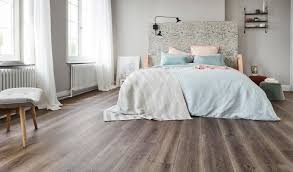 use laminate flooring or carpet