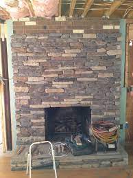 adjacent wallpaper to stone fireplace