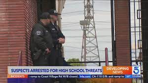 2 arrested after high threat