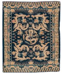 looking to invest in antique rugs