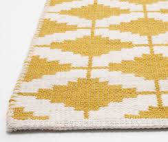 5 playful patterned rugs to transform