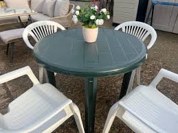 Green Plastic Table And 4 Stacking
