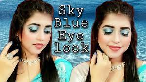 glam wedding guest makeup with sky blue