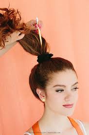 Simply put, it's a more undone version of the ballerina bun updo. How To Create A Quick High Messy Bun More
