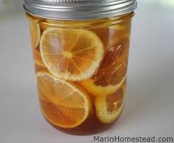 lemon ginger and honey in a jar cold