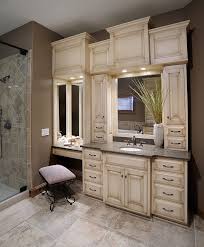 This vanity setup even features a custom makeup area complete with a lowered desk drawer to fit a small stool underneath. Mullet Cabinet Bathroom Suite Gorgeous Bathroom Bathrooms Remodel