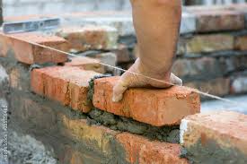 Building Brick Block Wall On