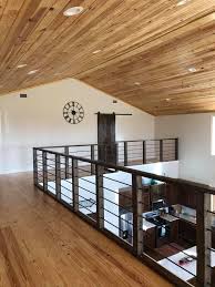 A long, tapered curve of pommele sapele set with three 6square 0.25 thick glass. Brookhaven Barndominium Simple And Spacious 40x60 Pole Barn Conversion To Barndominium Barn House Interior Barn Style House Loft House